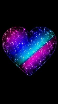 a heart shaped object with stars in the middle and pink, blue, and purple colors