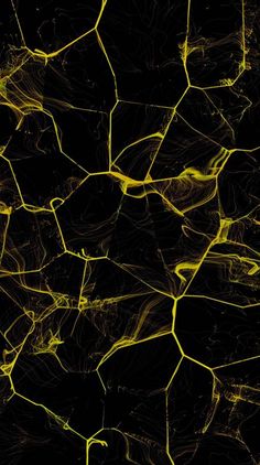 an abstract yellow and black background with lots of small cracks in it's surface