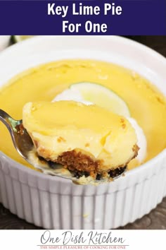 a close up of a bowl of food with a spoon in it and the words key lime pie for one