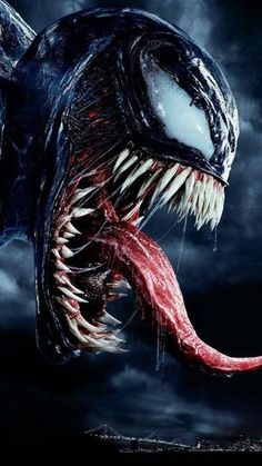 an advertisement for the movie venom is shown in purple and black with a large monster's mouth