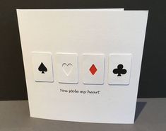 a card with four playing cards on it