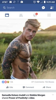 an image of a man with tattoos on his chest and arms, looking at the camera