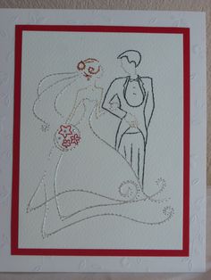 a wedding card with a drawing of a bride and groom