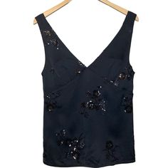 Beautiful Top With Floral Pattern Sequin Embroidery.Will Go Great With Any Outfit Can Be Worn On Its Own Or Under Blazer V-Neck Front And Back Pull Over Style,No Zipper Or Buttons Small Side Slits Sz Xs Shoulder To Hem 23 1/4” Armpit To Armpit Laying Flat 16 1/4” Brand New With Original Tags *43 Zara Sequin Top, Zara Sparkly Top, Black V-neck Tops With Floral Embroidery, Fitted Black Embroidered Top For Party, Fitted V-neck Embroidered Top For Spring, Zara Black Tops With Floral Embroidery, Black V-neck Top With Floral Embroidery, Chic Fitted V-neck Embroidered Top, Chic V-neck Fitted Embroidered Top