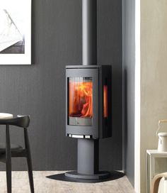 a wood burning stove in the corner of a room