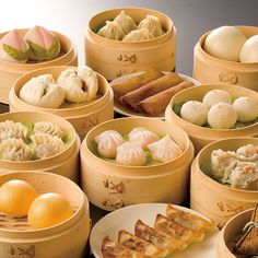 many different types of food in wooden containers