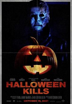 a movie poster for halloween kills with a scary face on it's head and hands