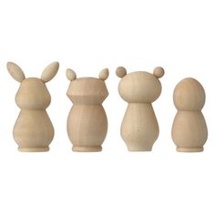 four wooden toy animals lined up in a row