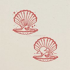 two red scallop shells sitting on top of each other