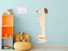 a child's room with a wooden dog height chart on the wall