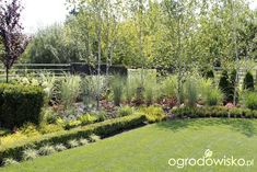 the garden is neatly trimmed and ready to be used as a focal point for this photo