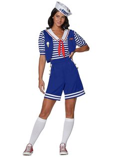 a woman dressed in sailor costume posing for the camera