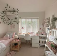 a bedroom with white walls and lots of pink accessories on the bed, desk and shelves