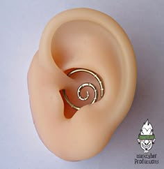 an ear with a spiral design on it