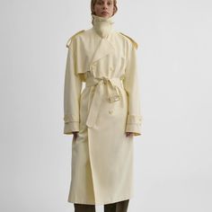 TRENCH COAT WITH ATTACHABLE SCARF
in cream technical polyester
US$4200 pheobe philo Leather Binding, Phoebe Philo, Belted Trench Coat, Knitwear Dress, Water Resistant Fabric, Double Breasted, Dress Skirt, Binding, Shirts Tops