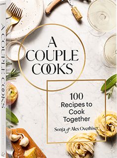 a couple cooks cookbook on a table