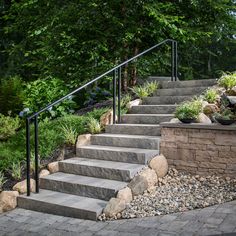 stone steps lead up to a garden area