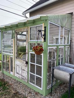 an old greenhouse is being used as a planter