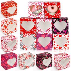 many different boxes with hearts on them and one has a donut in the middle