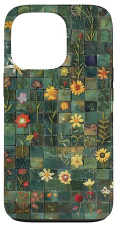 a cutting board with flowers painted on the front and back sides, all in different colors