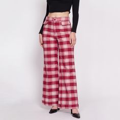 Vintage early 70s red & white plaid pants with a high waist, faux pockets, and a cuffed wide leg. Should work for men or women, see details below. Measurements and Condition: Fits like: Men's small, women's medium Fabric: Feels like poly/rayon Brand: None Condition: Very good/as is, with faint pink color bleed throughout the white parts (most prominent on the waistband and down the front rise - see close up). Still very wearable as is because it is fairly uniform. Waist: 31" Hips: 38" - taken at White Plaid Pants, Cuffed Trousers, Samurai Pants, Style Wide Leg Pants, High Waisted Flare Pants, 70s Vintage Fashion, Houndstooth Pants, Tie Waist Pants, High Waisted Flares