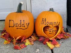 two pumpkins with the words daddy and baby carved into them