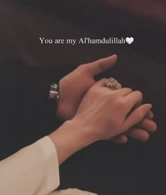 two hands holding each other with the words you are my alhamdullah