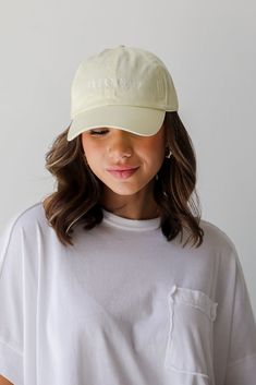 Calling all Savannah residents, the Yellow Savannah Embroidered Hat was made just for you! This cute hat is made of a soft cotton construction. It has a rounded top and a slightly rounded brim with "Savannah" embroidered on the front! Adjustable Strap Embroidered 100% Cotton Spot Clean with Damp Cloth or Sponge One Size Fits Most Embroidered Cream Cap, Cream Embroidered Cap, Cotton Hats With Curved Brim, One Size Fits Most, Spring Cotton Dad Hat With Flat Brim, Everyday Cream Cotton Hat, Cream Cotton Dad Hat With Curved Visor, Cream Flat Brim Baseball Cap One Size, Cream Cotton Cap, Cream Snapback Hat With Curved Brim