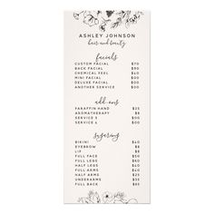 a white and black menu with flowers on it