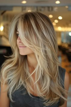 Long layered hair with side bangs offers a perfect blend of versatility and style. This timeless combination can transform your look, adding movement, dimension, and a touch of sophistication. From subtle layers to dramatic cascades,