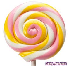 a pink, yellow and white lollipop on a stick