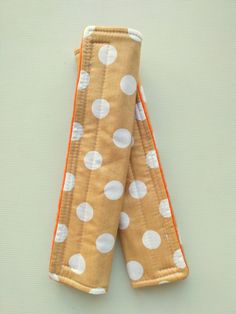 two brown and white polka dot cloth napkins