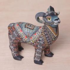 an animal figurine on a wooden surface