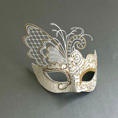 A great companion to the flourishing butterfly wings exalting the utmost elegance with the woman's and men white/gold mask.  Perfect for any event or function. Gold And White Masquerade Mask, White And Gold Mask, White Eye Mask For Wedding, Mask Couple, White Masquerade Mask, Wedding Masquerade, White Masquerade, Couples Masquerade Masks, Wedding Mask