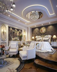 a large bedroom with white furniture and chandelier