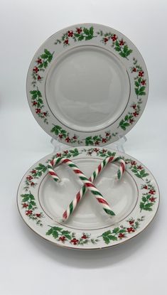 two plates with candy canes on them