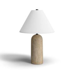 a table lamp with a white shade on it's base and a light bulb in the middle