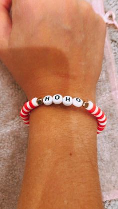 Super cute and preppy Christmas bracelet!! Never used, (except to model) wait to be bought!! Clay Bead Bracelet Ideas Christmas, Christmas Clay Bead Bracelets, Xmas Bracelets, Christmas Bracelet Ideas, Winter Bracelets, Holiday Bracelet, Winter Bracelet, Clay Beads Bracelet, Make Clay Beads