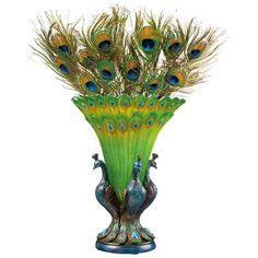 there is a vase with peacocks in it