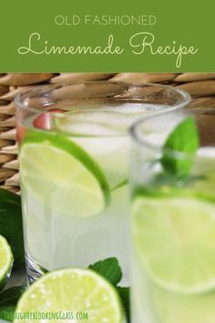 an old fashioned lemonade recipe with limes and mint on the rim in glasses