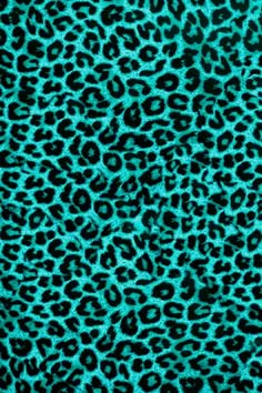 a green and black animal print fabric