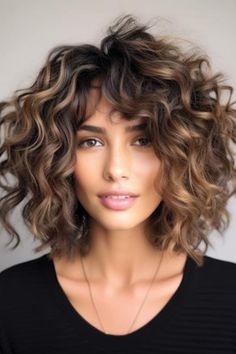 Choppy cut with curls will play up your natural curl. The ragged layers add more body and texture to the hair. Click here to check out more cute shoulder-length curly hairstyles to try this year. Shoulder Curly Haircuts, Short Curly Balayage Hair, Choppy Curly Hairstyles, Curly Layered Bob Mid Length, Shaggy Bob Curly Hair, Naturally Curly Shoulder Length Hair, Shoulder Length Curly Hair With Layers, Curly Hair Shoulder Length