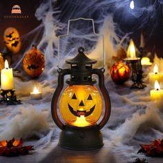 a halloween lantern with jack - o'- lanterns in the background