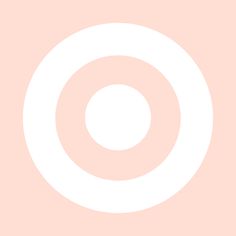 a white circle on a pink background