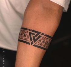 a man with a tattoo on his arm