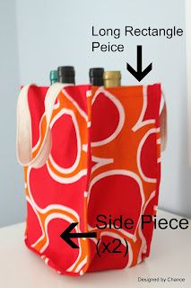 an orange and red tote bag with two bottles in it, labeled long rectangle piece