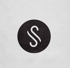 a black and white logo with the letter s