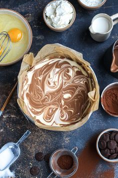 an assortment of chocolates and other ingredients on a table