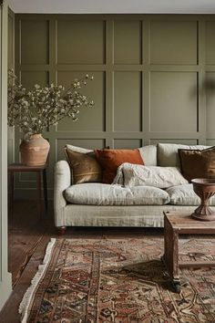 a living room filled with furniture and decor