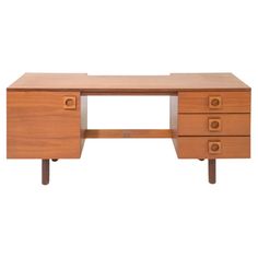 a wooden desk with three drawers on one side and an open drawer on the other